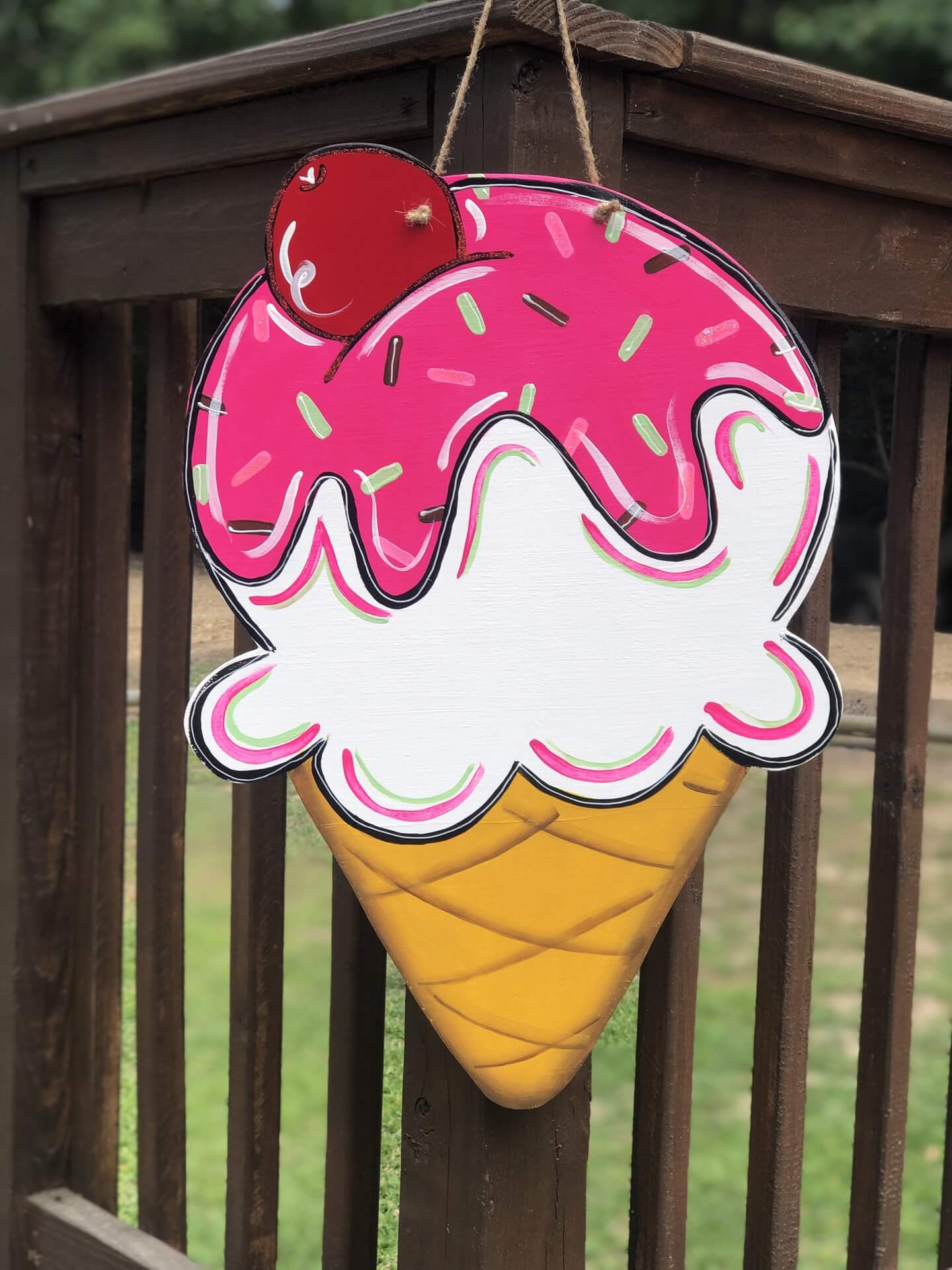 Ice Cream Cone Painted for a door hanger. Pink and white with a cone on the bottom