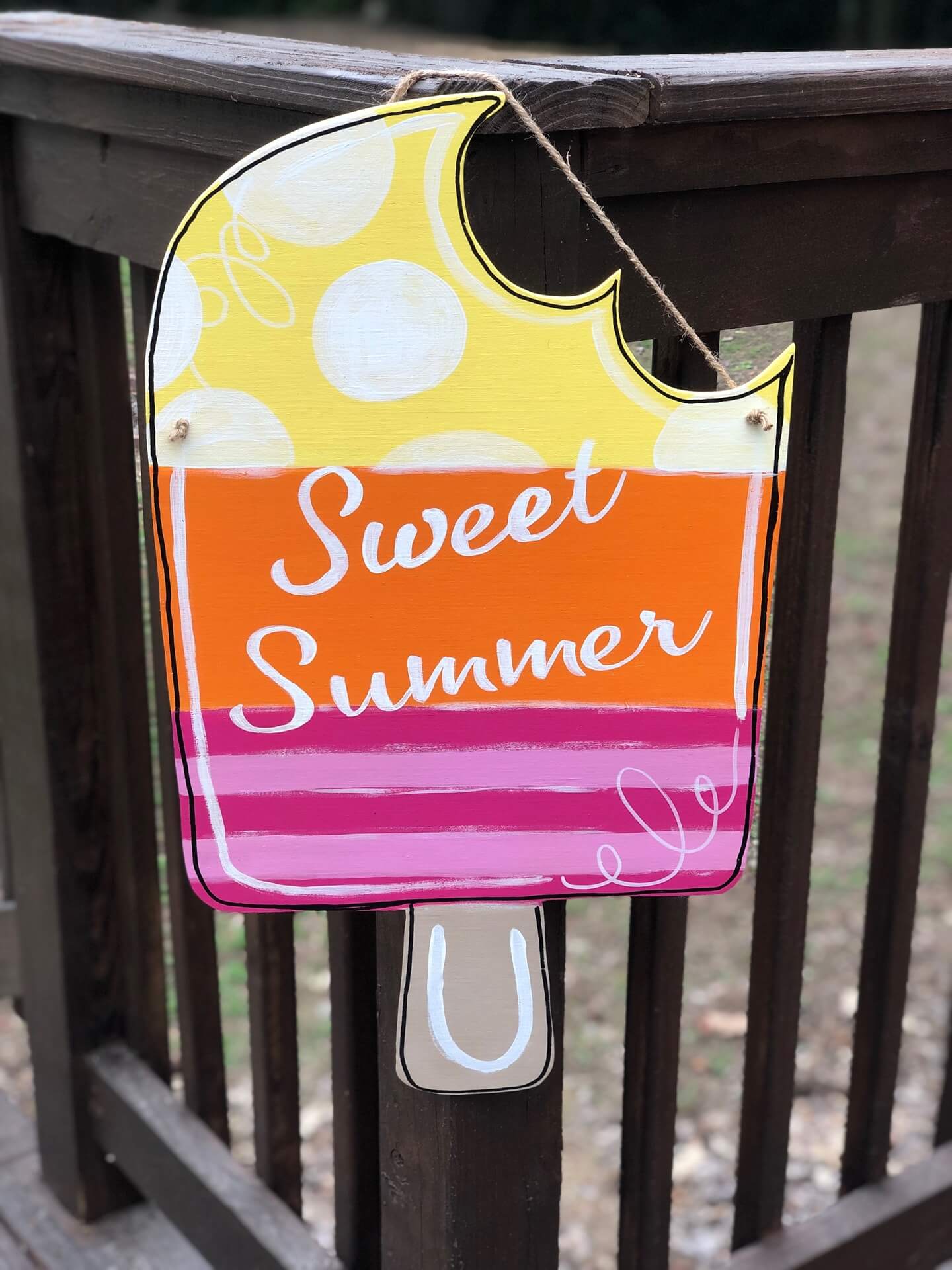 Popsicle Painted Yellow, Orange, and Pink with the words Sweet Summer on it