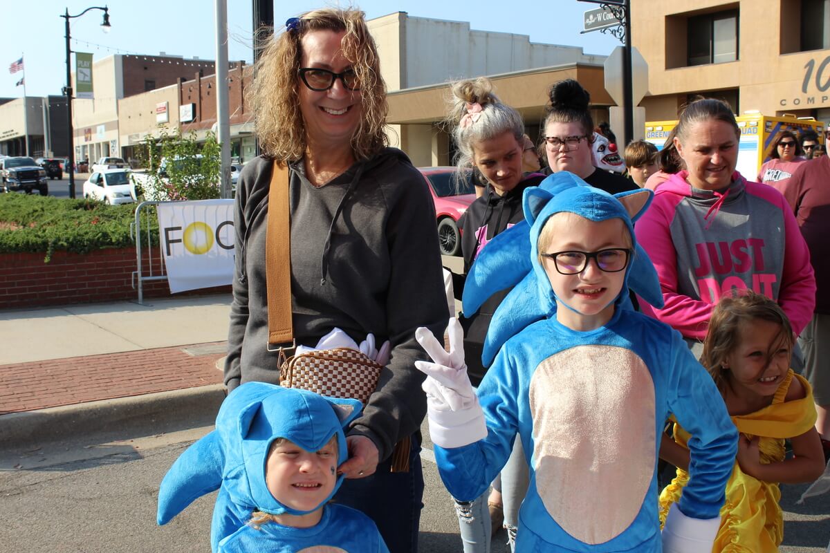 Family of Trick or Treaters Downtown