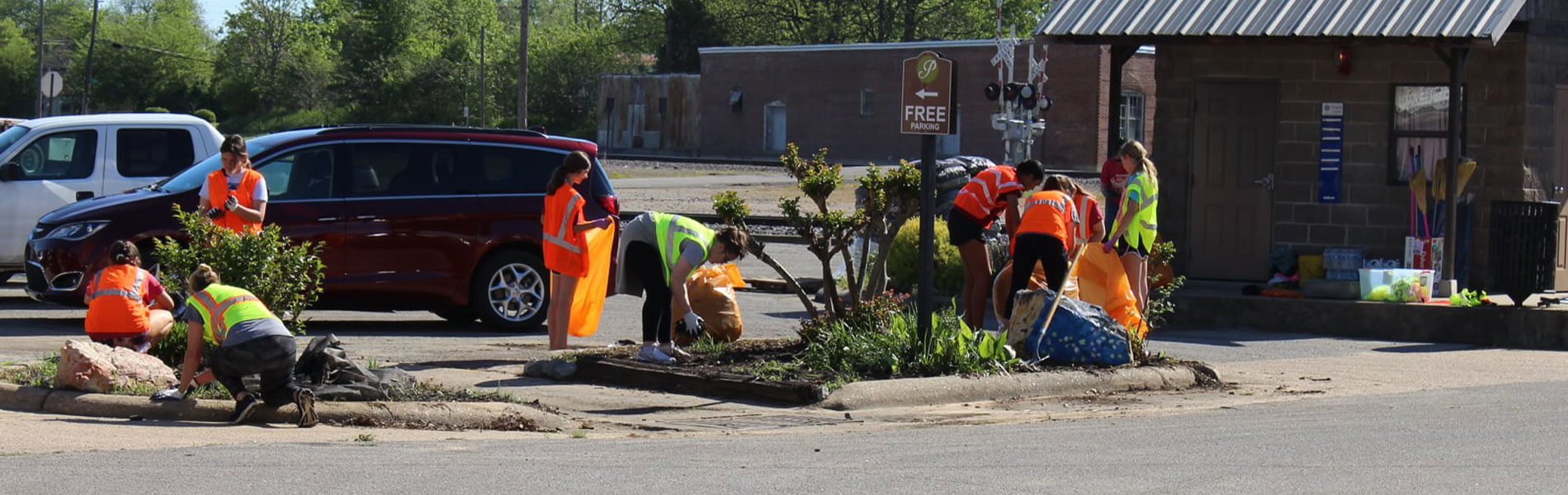 Volunteers helping clean up around Downtown Paragould.