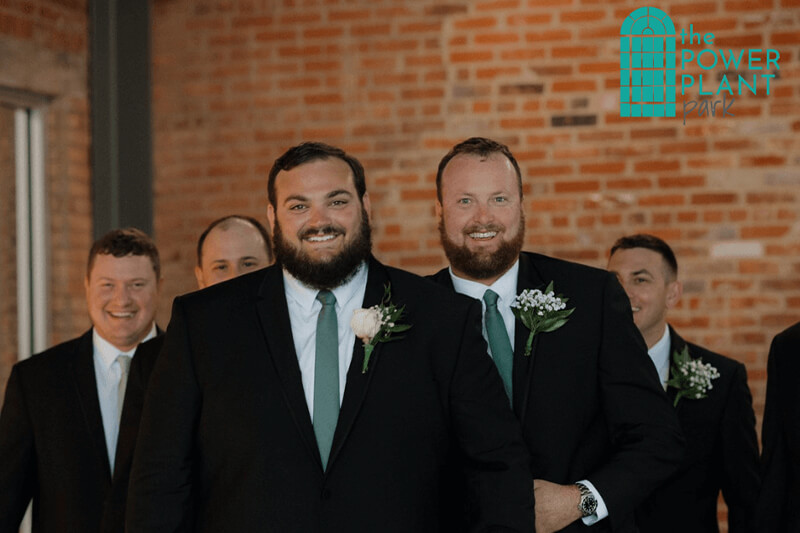 Groomsmen posing for a picture at The Station