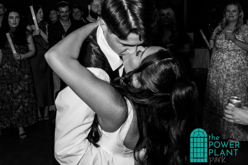 Wedding Couple share a kiss inside The Station.